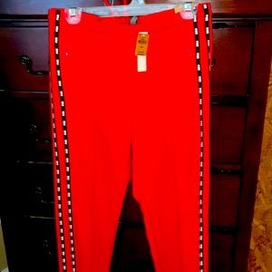 Brand new!!! Women’s red track pants size medium. Great for back to school!